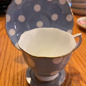 Royal Albert rare vintage blue polka dot teacup and saucer. Gold rim